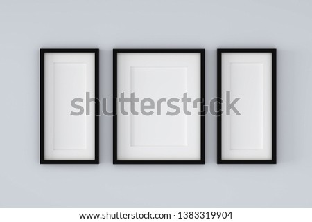 Blank black picture frame template for place image or text inside on the wall.