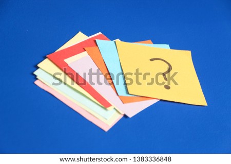question marks written reminders tickets on background