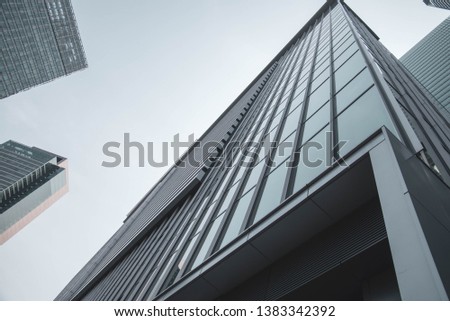 Mirror glass building in Nagoya, Japan.architecture, abstract, background, modern, white, building, design,  detail, structure, contemporary,  architectural, construction, glass. Royalty-Free Stock Photo #1383342392