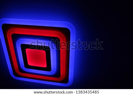 Colorful neon light in blue background