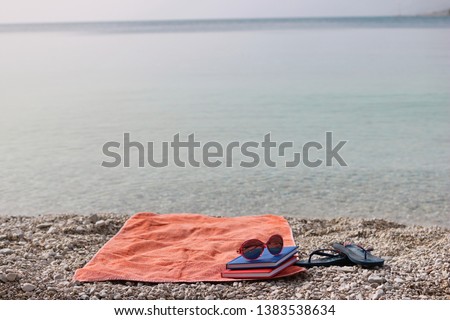 Books on the beach by the sea