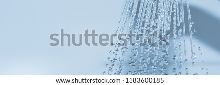 Water splashing in douche - clean body Royalty-Free Stock Photo #1383600185