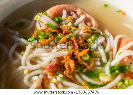 Banh Canh - one of most popular soup noodle in the Ho Chi Minh city, Ha Noi, Da Nang, Vietnam with  big rice noodles, pork leg meat, dry onion, green onion and fish sauce...Vietnamese food