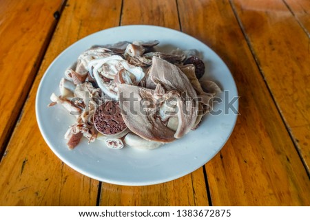 Chao Long or Pig organs porridge - one of most Popular dishes in the Ho Chi Minh city, Ha Noi, Da Nang, Vietnam with pig heart, Pig organs viscera... and fish sauce. Vietnamese food