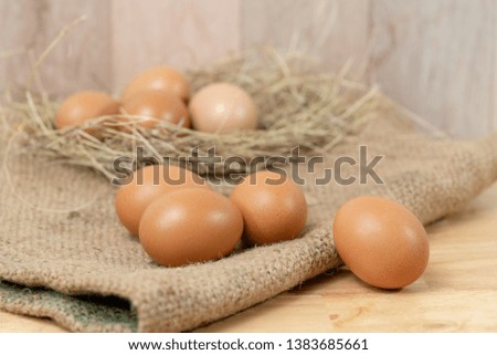 Fresh brown eggs organic arranged on Burlap Sack