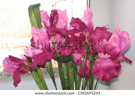 pictured in the photo Bouquet of artificial violet irises