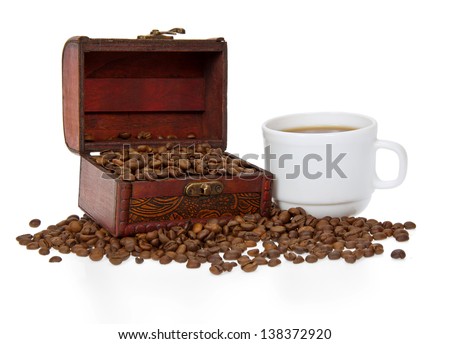 Chest with coffee grains, a cup about the coffee isolated on white