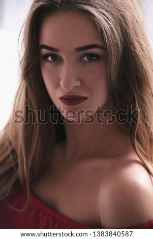 Close up portrait of beautiful young woman's face