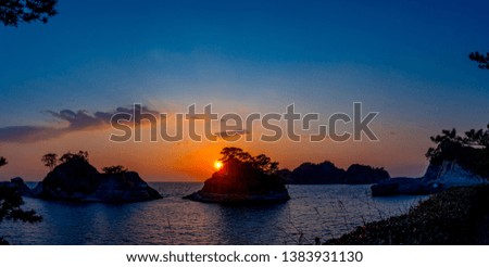 The sunset view of the islands of "Dogashima" located in the west coast of Izu Peninsula, Shizuoka Prefecture, Japan, in a winter day.