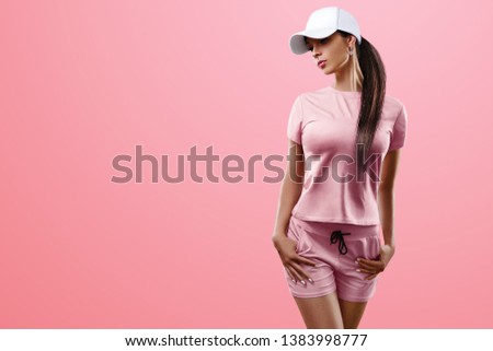 Beautiful girl in a white cap on a pink background. Beauty photo, beauty. copy space