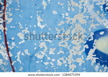 Abstract grunge blue, navy background texture. Peleed old paint, cracked blue wall