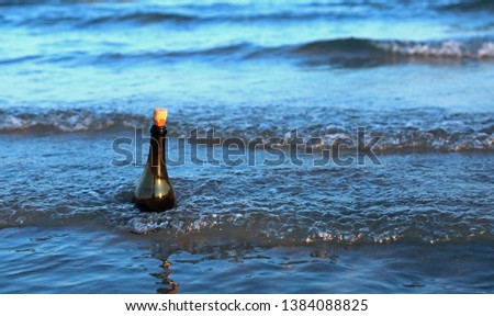 famous song says Message in a Bottle in this picture on the ocean