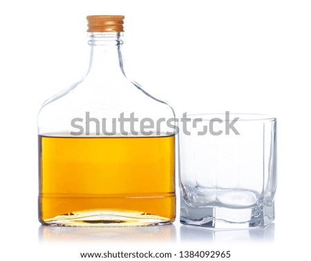 bottle cognac alcohol and glass on a white background. Isolation