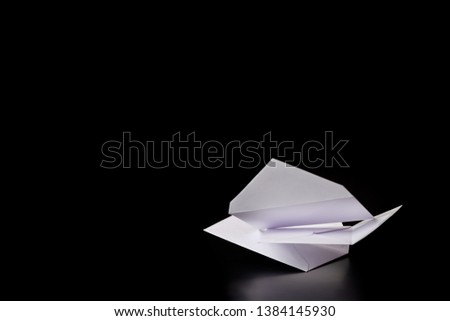 White envelopes fall from the top on a black background.