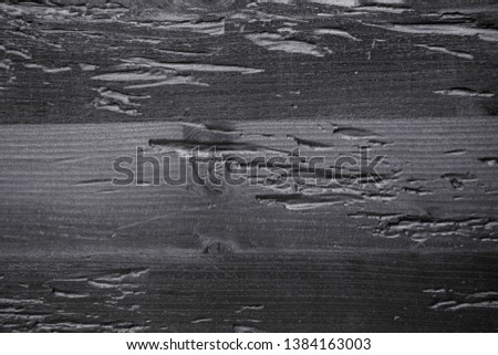Closeup decorative black charred wood board texture background.