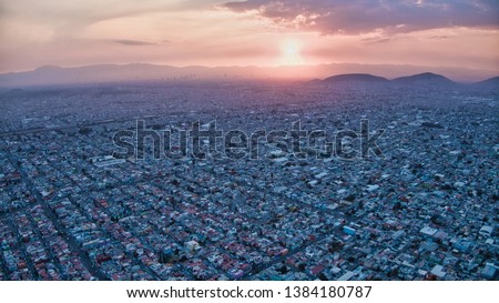 Sunset over Mexico City, Mexico, aerial view Drone