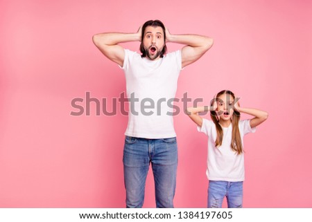 Close up photo beautiful she her little small lady he him his daddy staring on ho expression hold hand arms palms heads wear casual white t-shirts denim jeans isolated pink bright background
