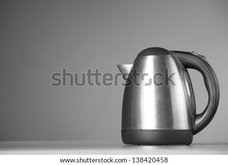 Kitchen Kettle on a gray background. Closeup