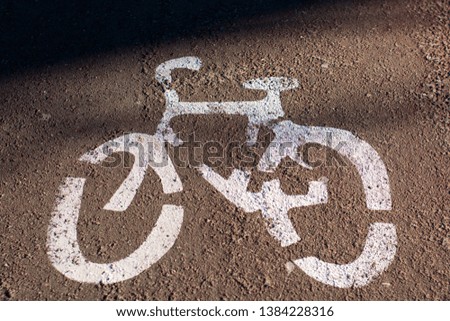 Bike traffic sign on the ground, 2019