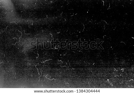 Black grunge scratched background, old film effect, distressed scary texture