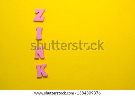 word zink with wooden letters
