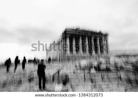 Out of focus shot of a temple in Italy  with people around