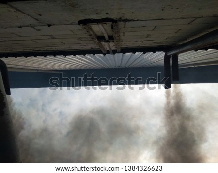 smoke billowed from the flour mill