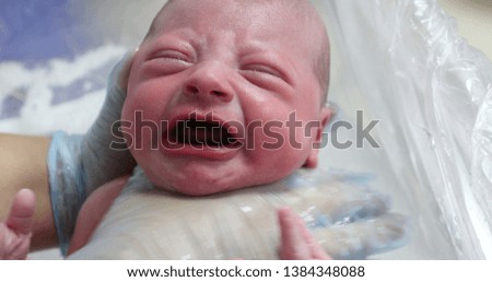Newborn baby bath after birth