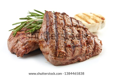 grilled beef fillet steak meat isolated on white background Royalty-Free Stock Photo #1384465838