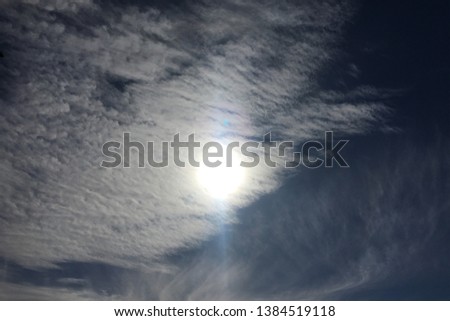 thunder clouds, sky blue background. cloud blue sky and sun