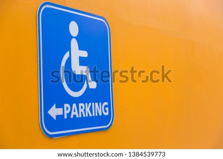 Disabled handicap parking space reserved for parking.