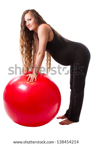 Pregnant fitness woman doing exercise on fit ball on white background   The concept of Sport and Health