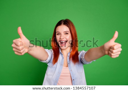 Close up photo beautiful funky she her foxy lady hold hands arms fingers thumbs up advising buy buyer black friday best low little price wear casual jeans denim shirt isolated green bright background