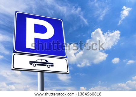 Parking signal with clouds and sky on background