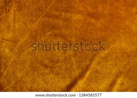 velvet texture background fortuna gold color.  festive baskground. expensive luxury, fabric, material, cloth.Copy space.