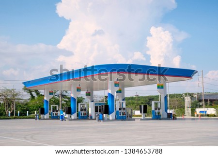 Gas station with blue sky.
 Royalty-Free Stock Photo #1384653788