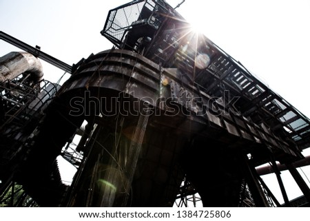 Old steel factory Retro photography Industrial, old factory, metal pipe, dark interior decoration of large hall for production or warehouse.soft focus.