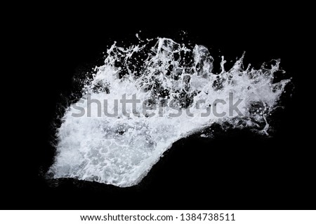 Water Splash Isolated On The Black background Royalty-Free Stock Photo #1384738511