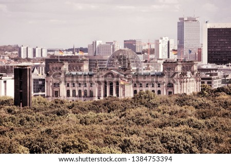 Berlin, Germany. Capital city architecture aerial view with Tiergarten park and the Reichstag. Filtered colors style.