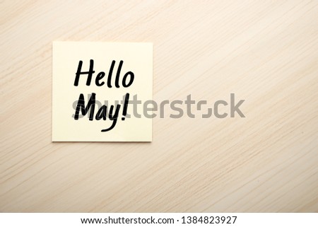 Hello May concept on the sticky note paper.