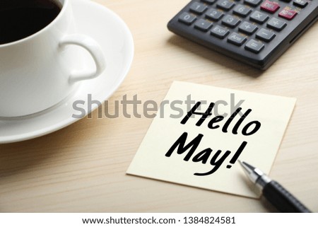 Hello May concept on the sticky note paper.