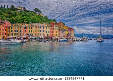 A cloudy day at colorful Portofin, Italy  -  Italian fishing village, holiday resort famous for its picturesque harbour and celebrity and artistic visitors.