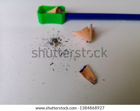 blue pencil and pencil sharpener