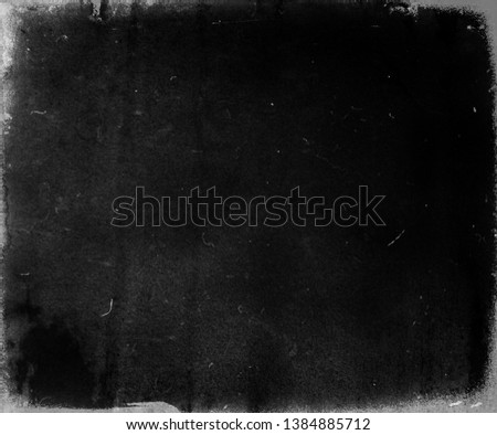 Grunge black scratched background, old film effect, scary distressed texture, copy space