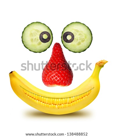 Face from fruits isolated over white background