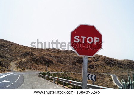 Stop sign on the lonely road	