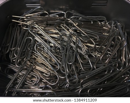 The paper clips is one of accessories in any offices. It is used to clip the document to keep it together.