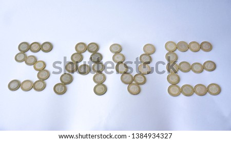 Saving and growth concept with metal coins isolated on white background. Saving money for education, summer holiday vacation, new house, new entrepreneurship or basic needs loan. Step by step.