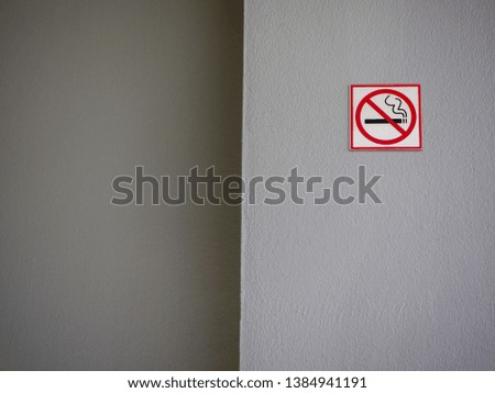 No smoking symbol on the wall.