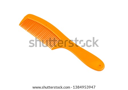 View of hair comb isolated on white background. Selective focus.